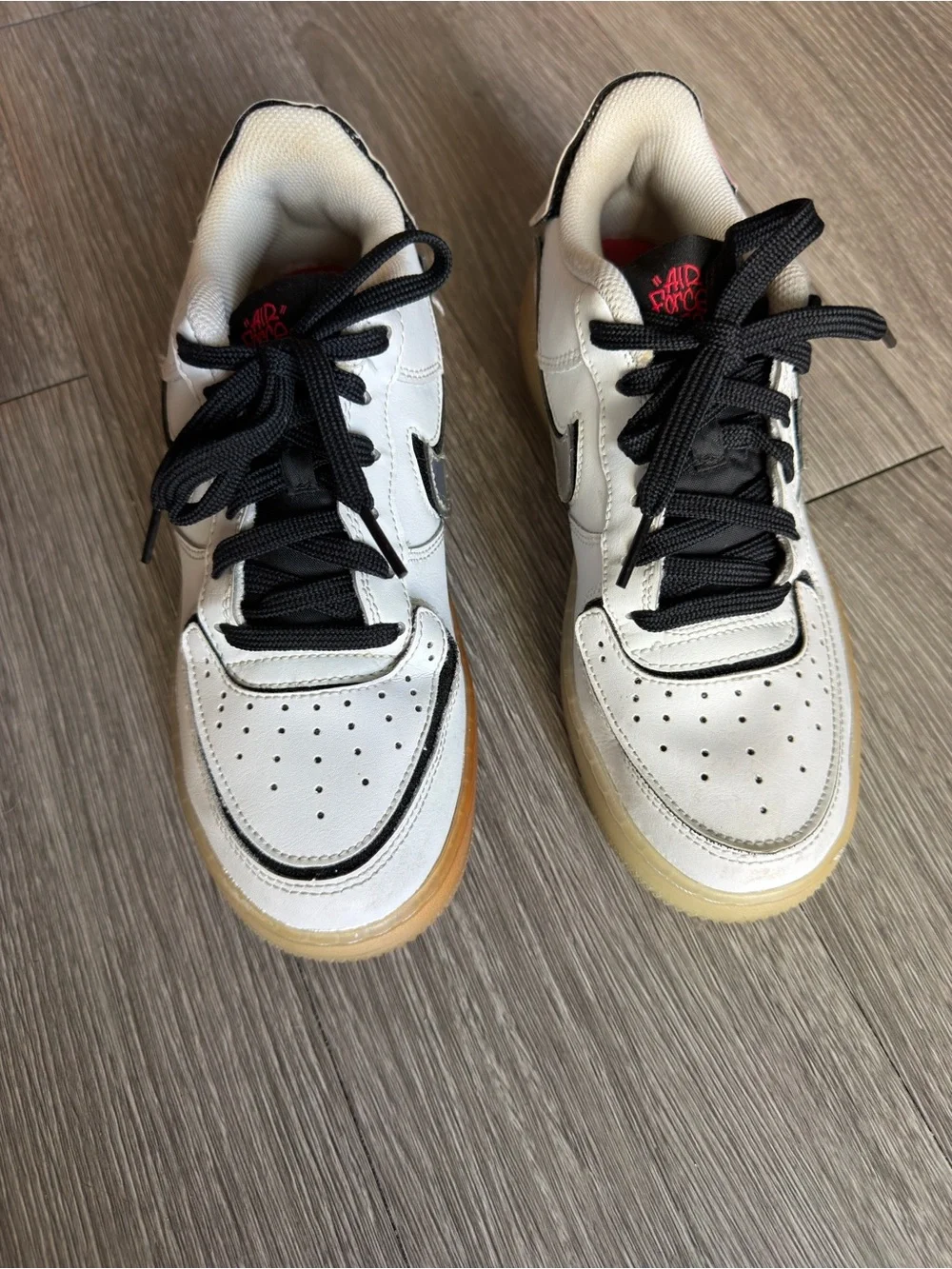 Nike Air Force One White Low-Top Sneakers with Black Accents Silver Logo
